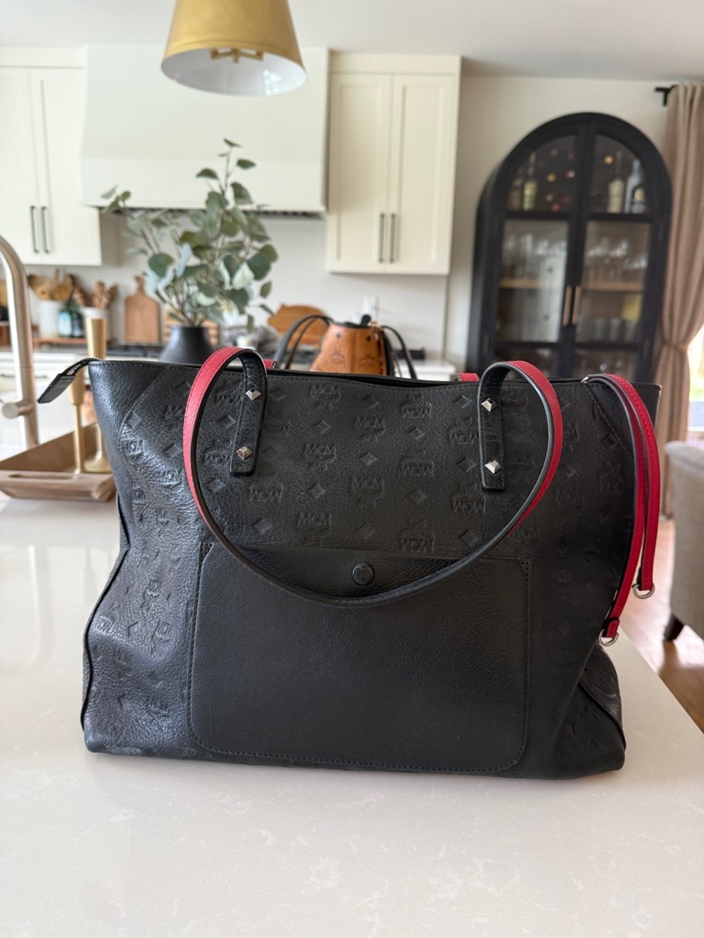 MCM Black Messenger Bag with Red Trim Accents